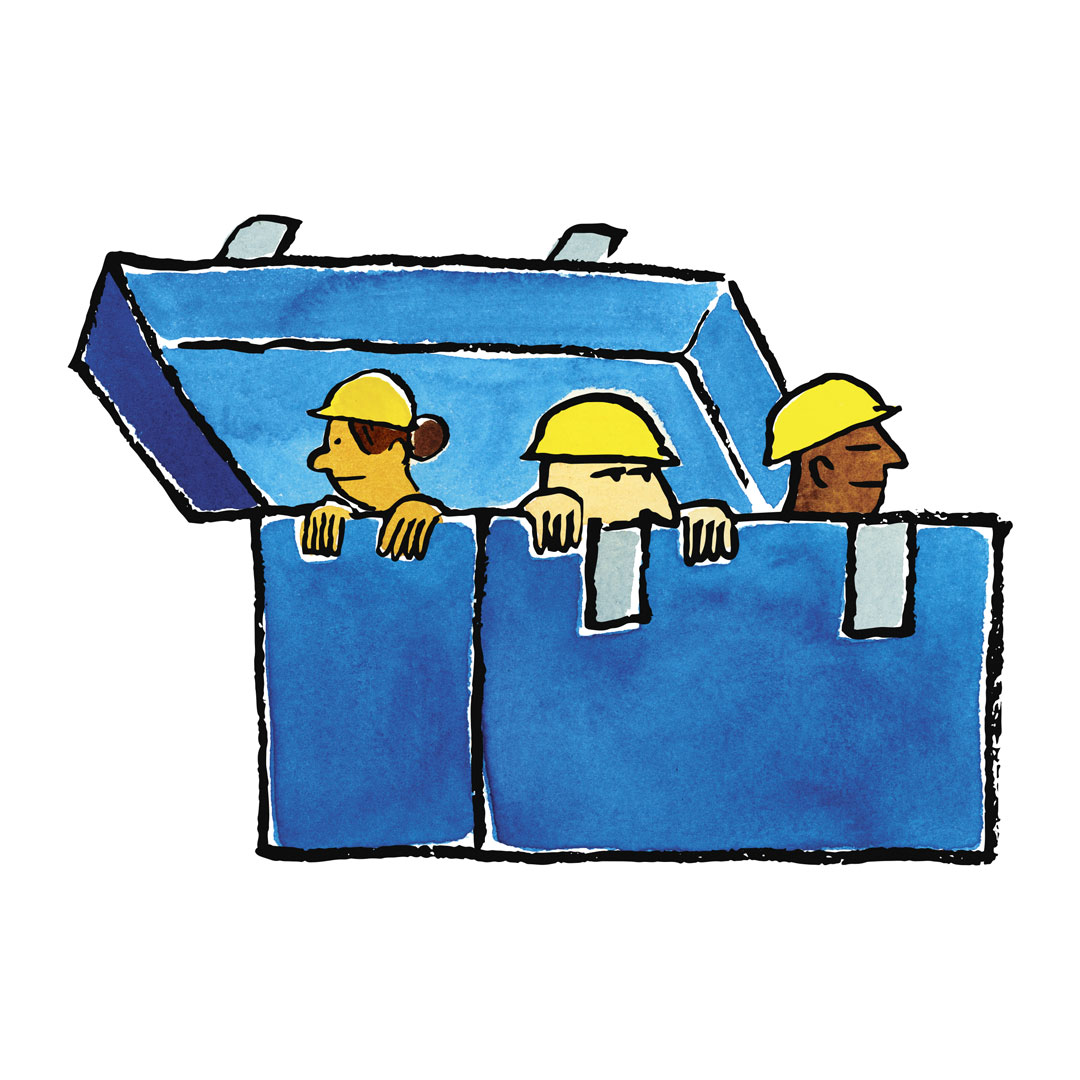 construction workers peaking out of a large lunchbox