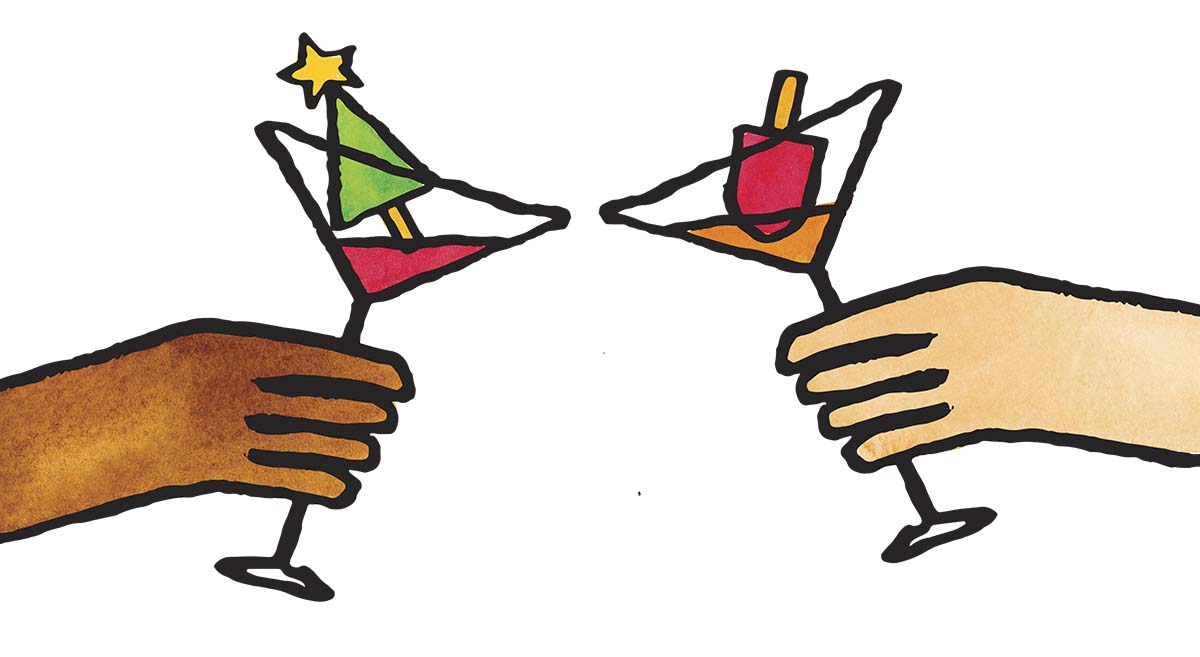 Two martini's in a cheers pose. One with a Christmas tree in it and one with a Popsicle.