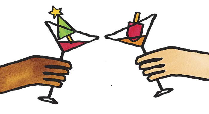 Two martini's in a cheers pose. One with a Christmas tree in it and one with a Popsicle.