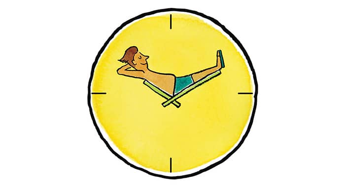 A person in a bathing suit sitting on the hands of a clock