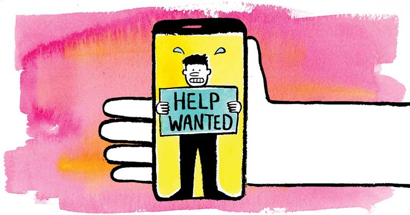 a hand holding a phone with a person holding a help wanted sign